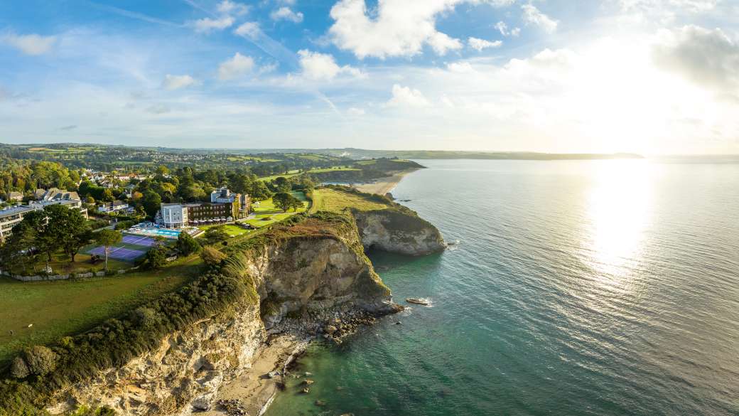 Carlyon bay hotel ariel view on cliff tops overlooking bay sunrise