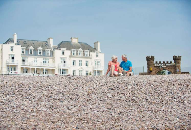Belmont Hotel Couple Enjoying Pebble Beach in front of Hotel
