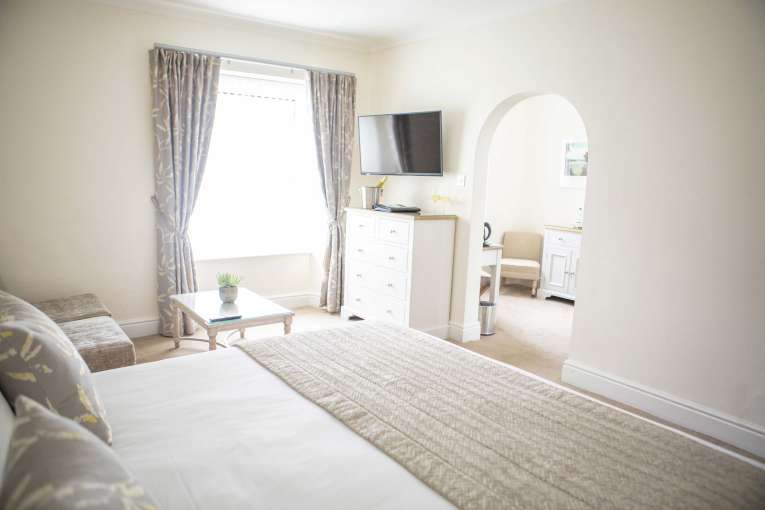 Royal Duchy Hotel Accommodation with Bed and Seating Area