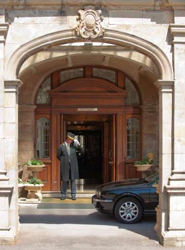 Doorman welcoming car at the Victoria hotel